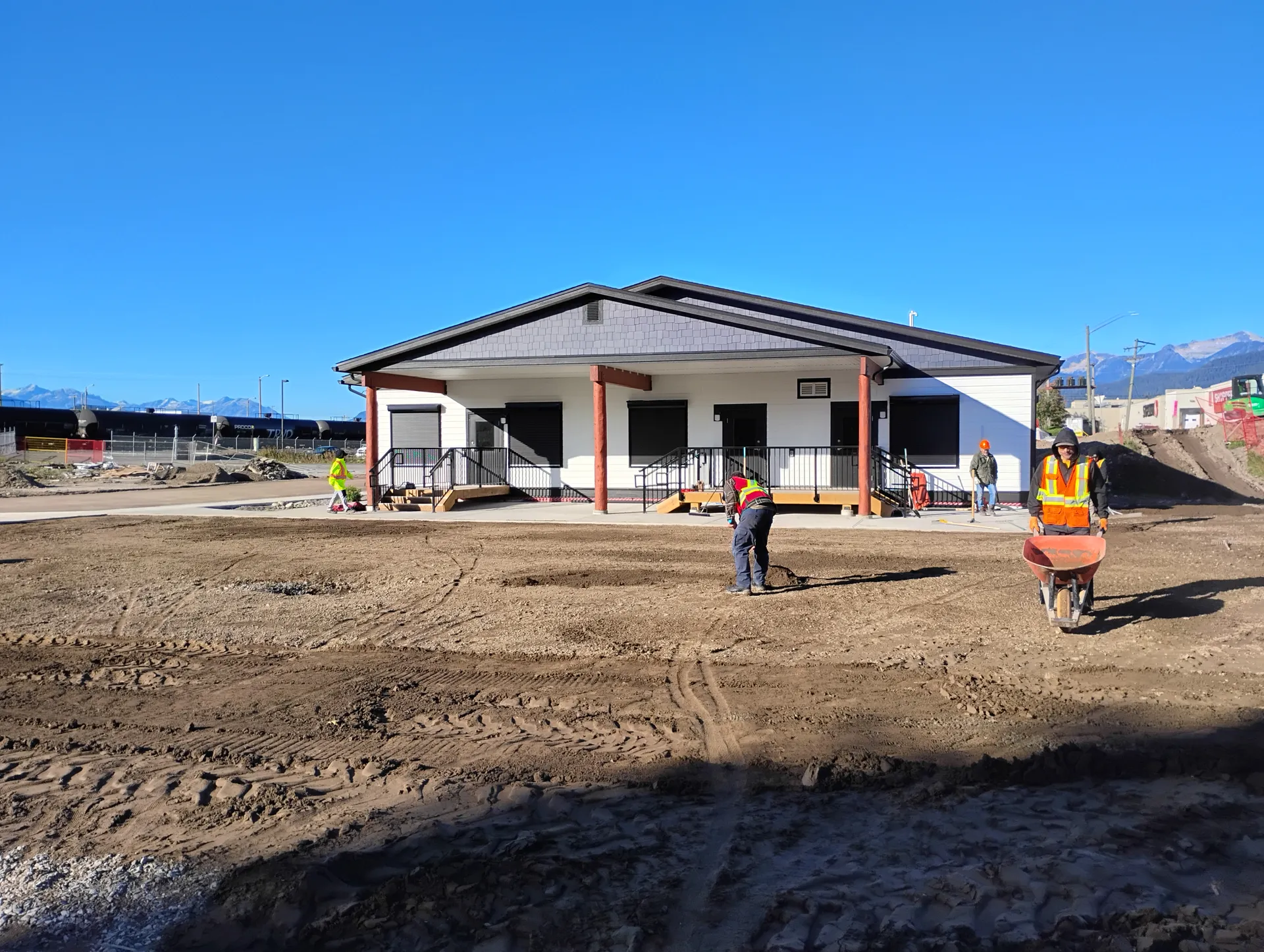 The new public building with bare prepared ground in front